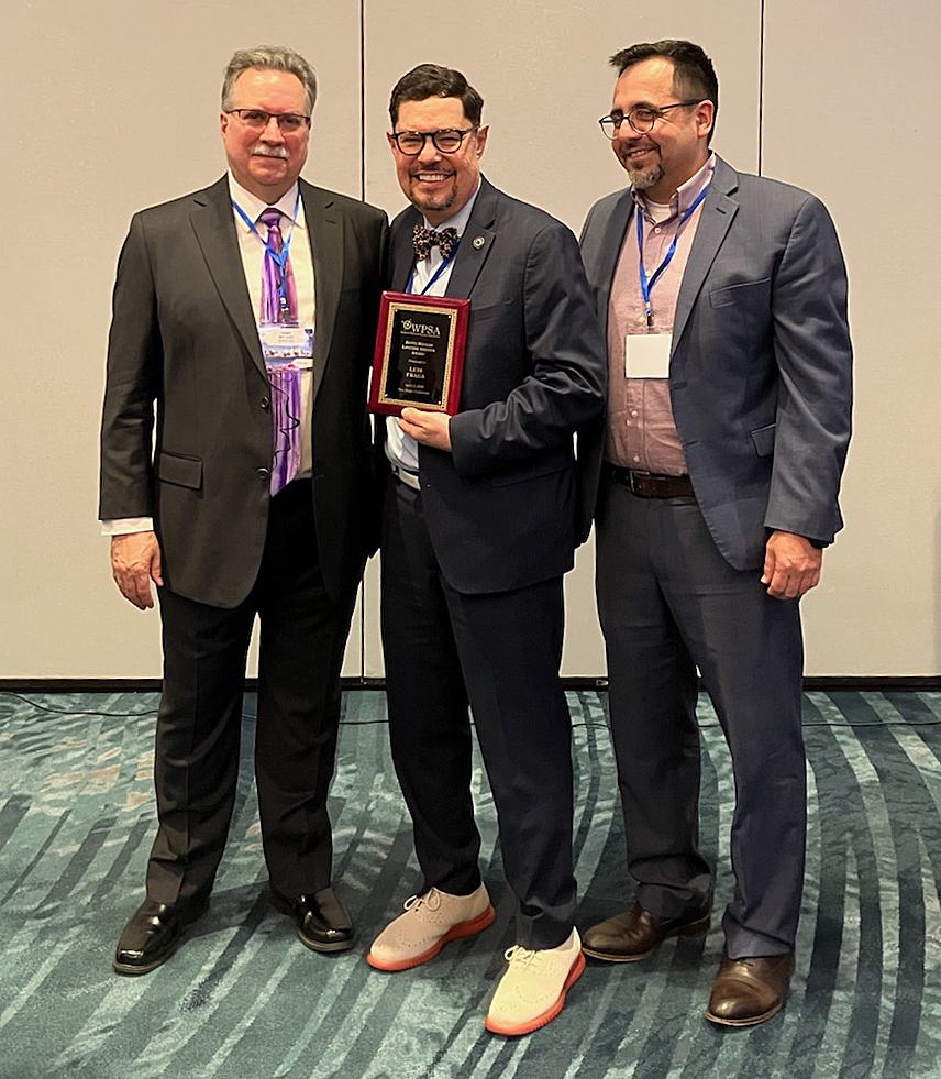 Luis Fraga (center), WPSA President Tony Affigne (left), and Ricardo Ramirez, Moulds Award Committee chair Fraga